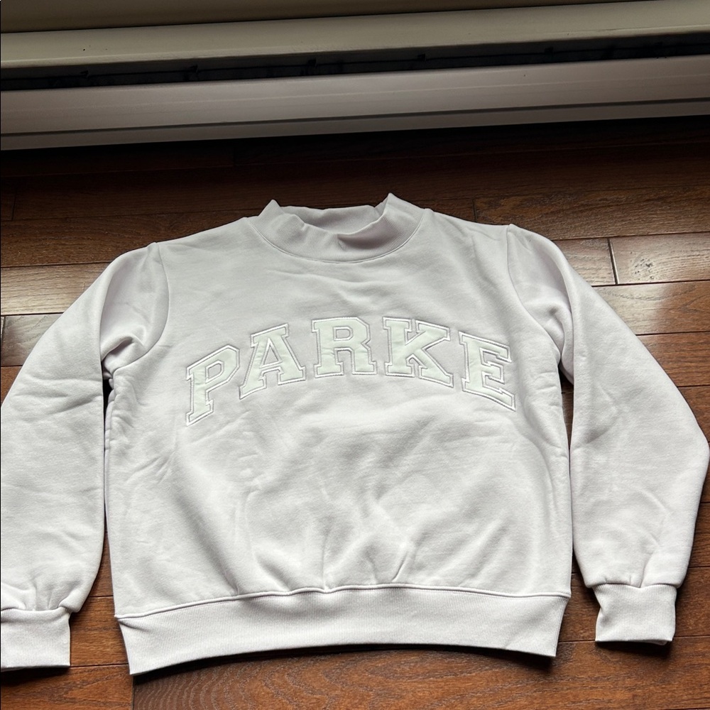 Price is Firm Ladies size S/M lilac and white Parke Mockneck sweatshirt